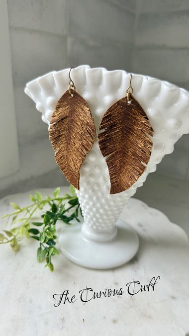 Whisperleaf Feathers